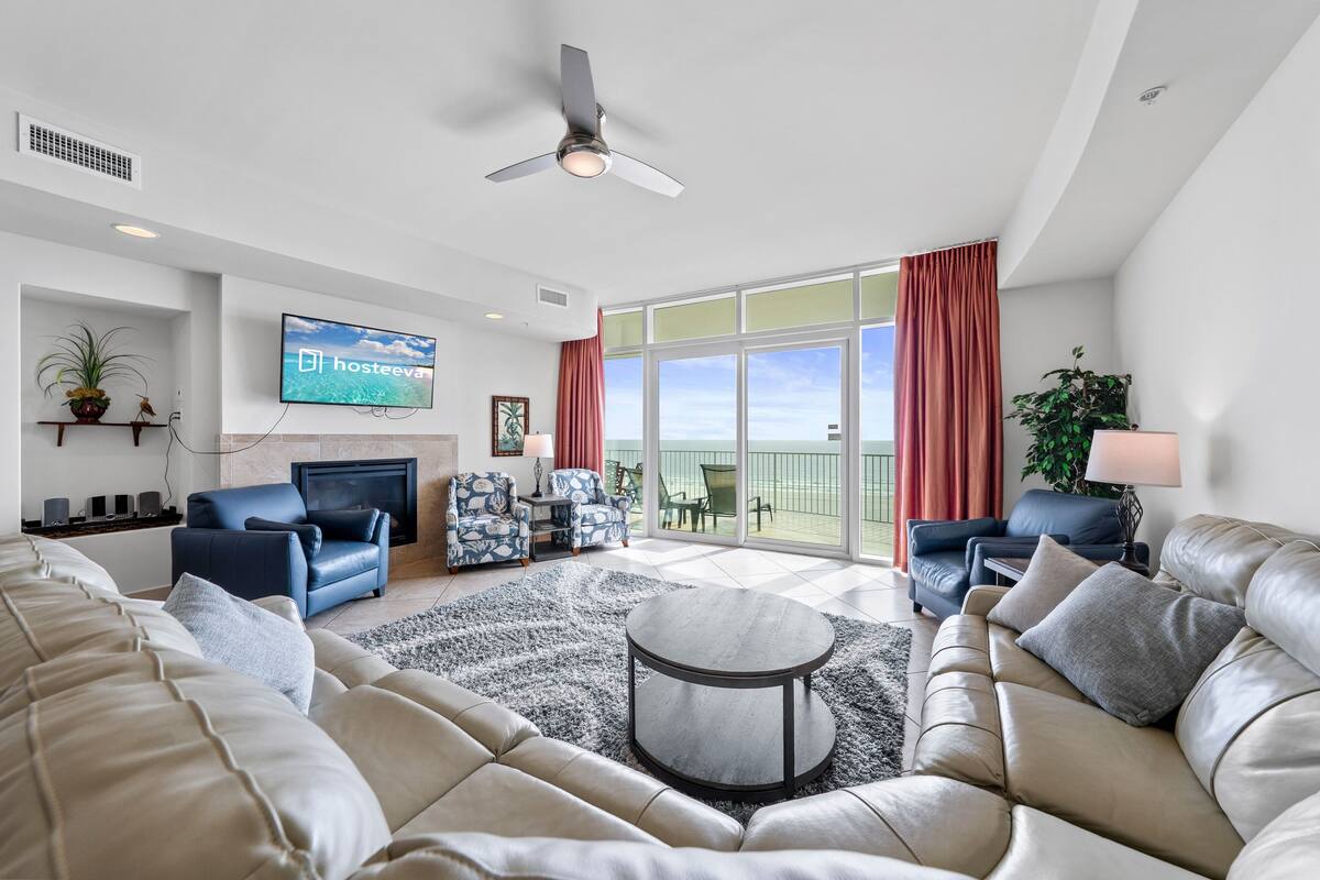 Signature Condo, 3 Bedrooms, Balcony, Beach View | Living room | Fireplace