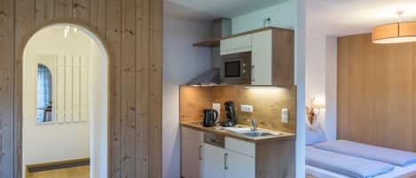 Appartement | Cuisine privée | Chaise haute