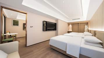 Senior Quadruple Room, City View | Premium bedding, minibar, desk, blackout drapes