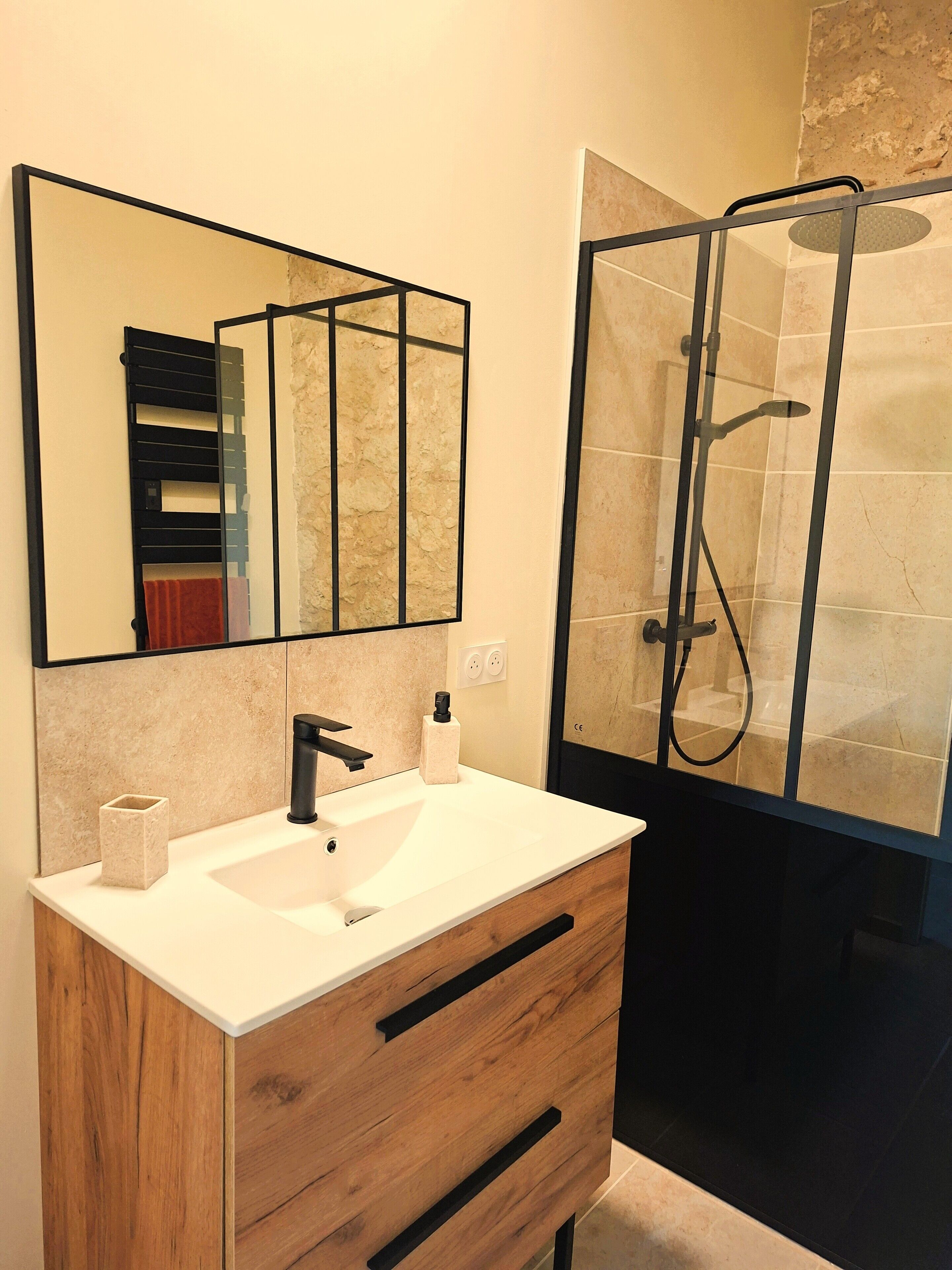 Shower, hair dryer, towels, toilet paper