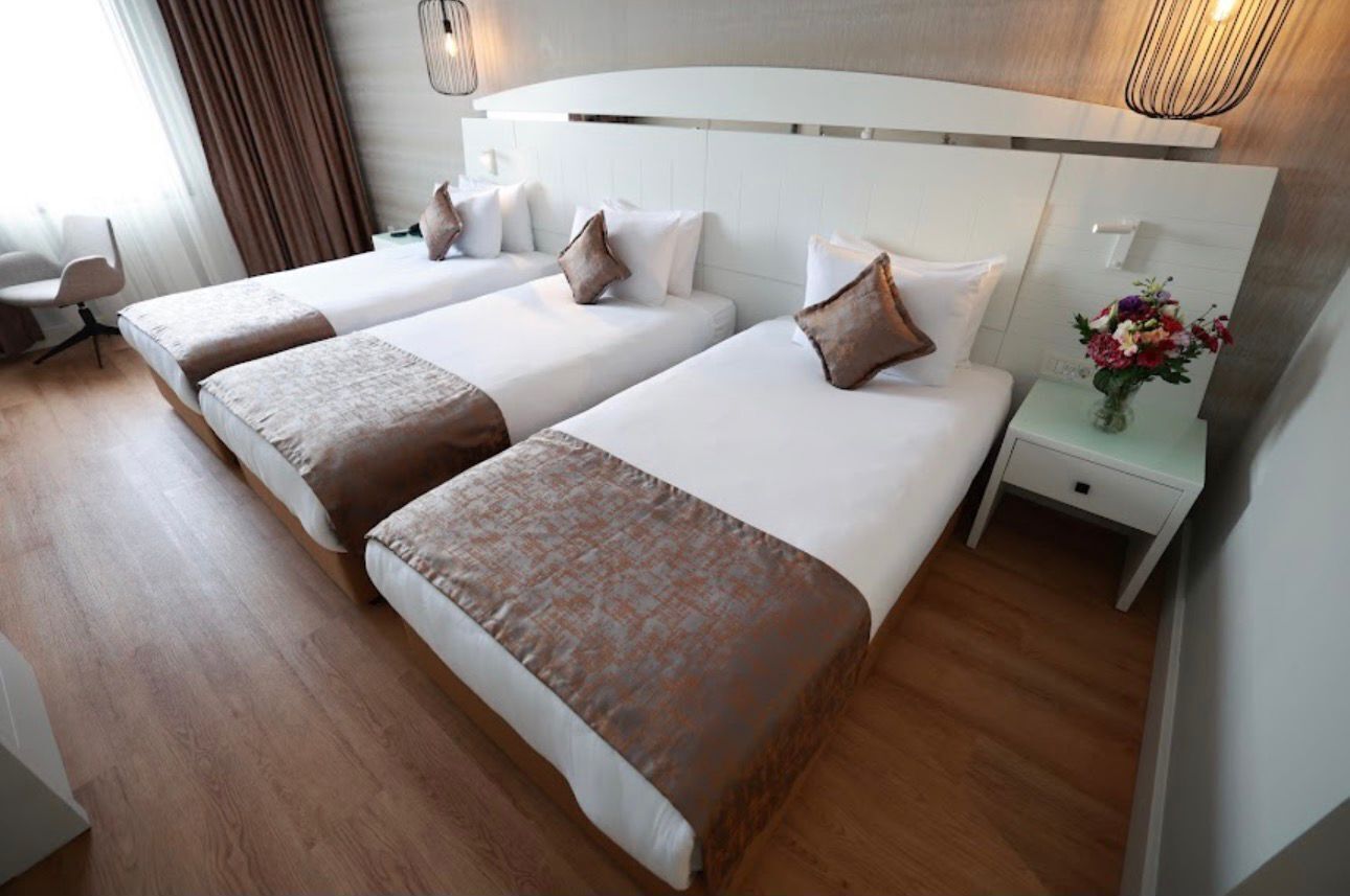 Standard Triple Room, City View | Desk, iron/ironing board, free WiFi