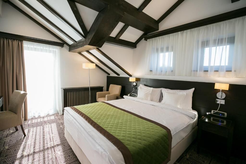 Deluxe Double or Twin Room, Balcony, Mountain View | In-room safe, soundproofing, iron/ironing board, free WiFi