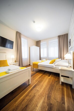 Deluxe suite | Verduisterende gordijnen, gratis wifi, beddengoed
