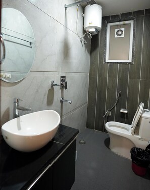 Luxury Apartment, Balcony, Garden View | Bathroom | Shower, towels, soap, shampoo - Suite 16 Studio Apartment (Gurugram)