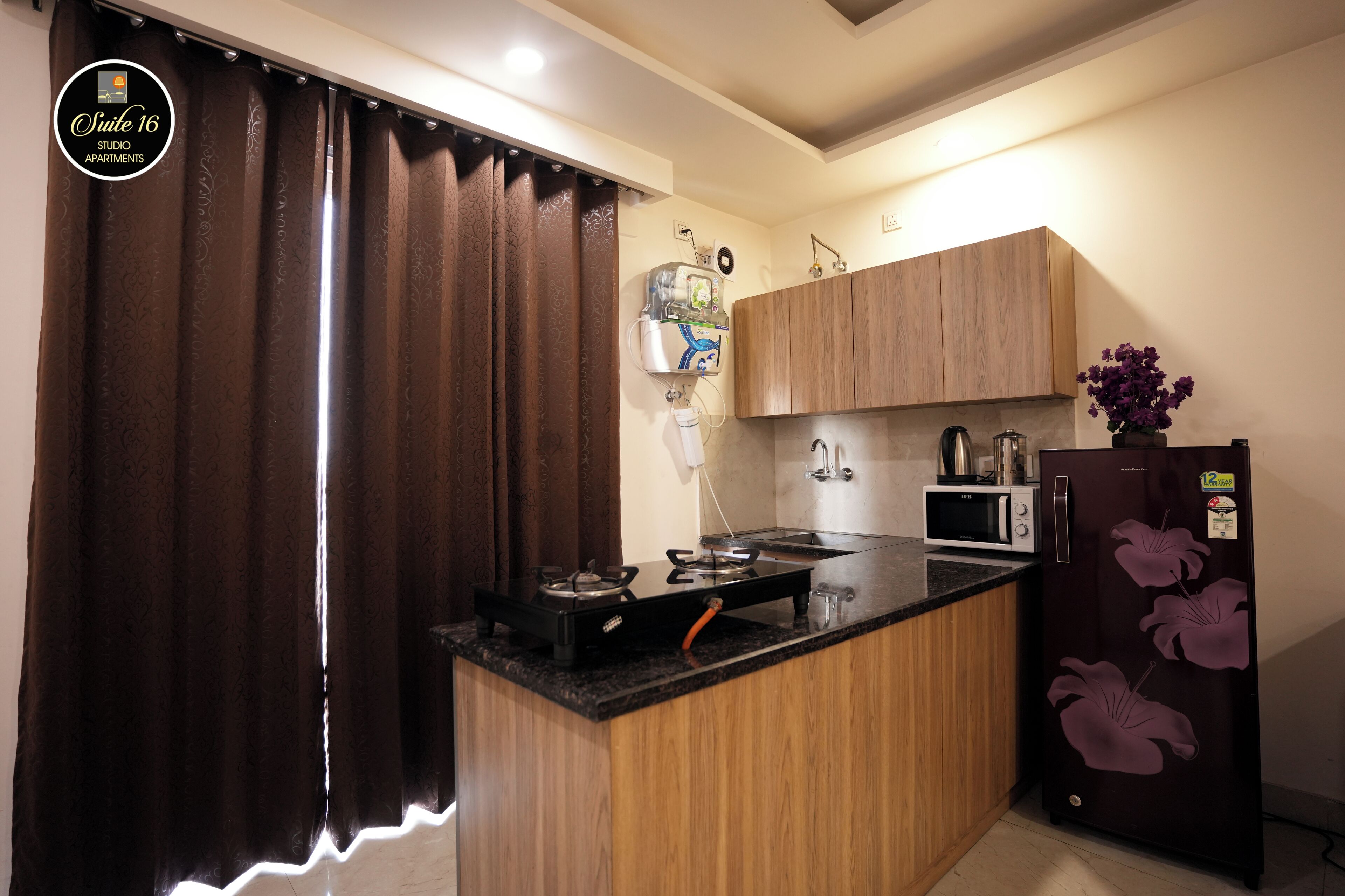 Luxury Apartment, Balcony, Garden View | Private kitchen | Fridge, microwave, oven, stovetop
