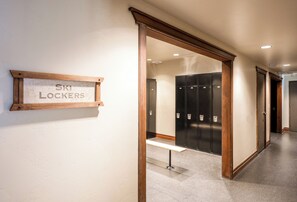 A hallway with lockers and a sign labeled 'Ski Lockers'. - 2BR Canyons Ski-in/Ski-out With Resort Amenities (Park City)