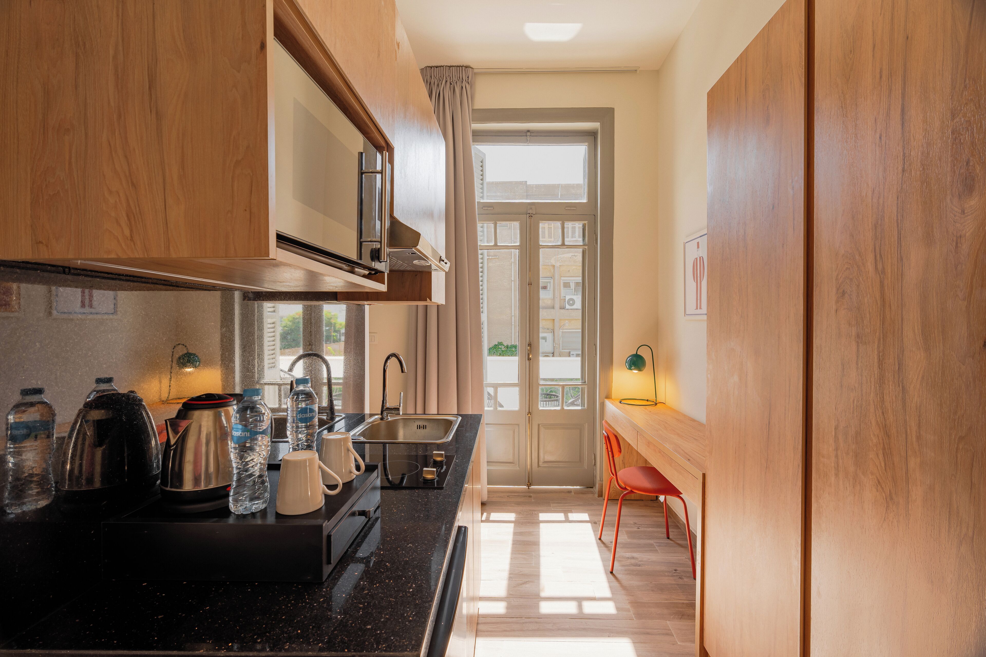 Monolocale Standard, 2 letti singoli, balcone, vista giardino | Cucina privata