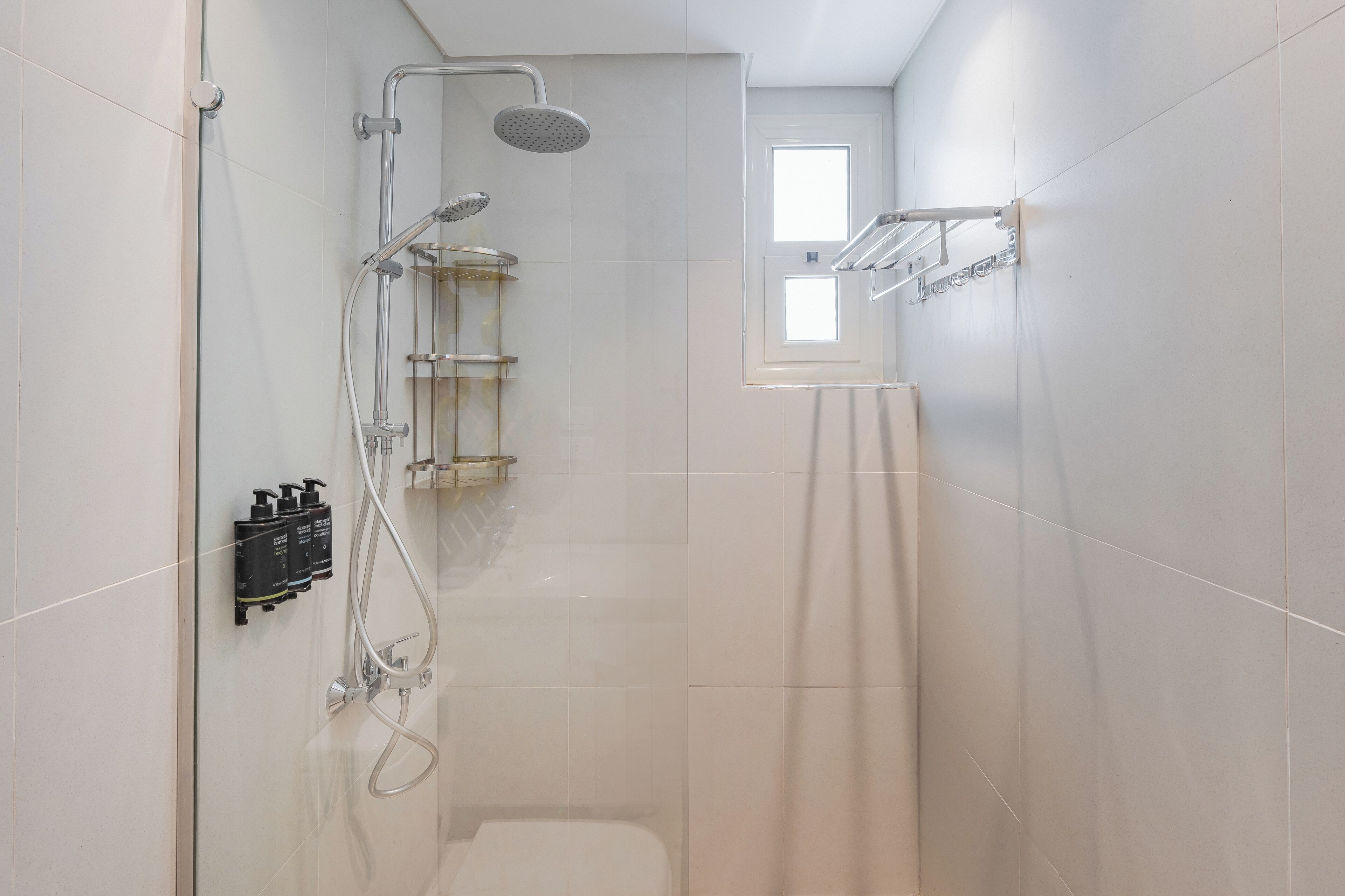 Bathtub, hair dryer, towels, soap