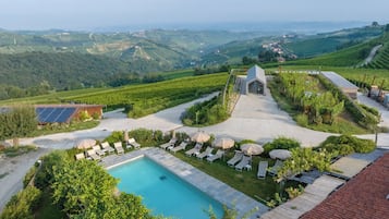 Seasonal outdoor pool, pool umbrellas, sun loungers
