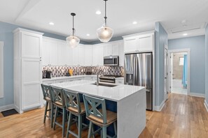 Fridge, microwave, oven, stovetop - 8BR/5.5BA Home - Oceanfront, Water Views, Game Room, Pool, Elevator, Sleeps 20 (Oak Island)