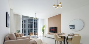 TV - LUX 2BR Lagoon View – District One, 10–15 min Burj Khalifa (Dubai)