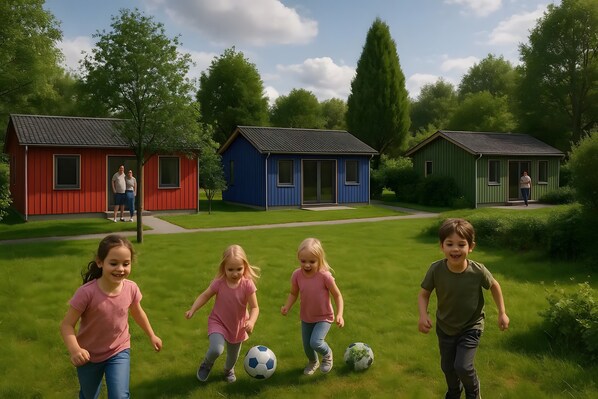 Children’s area - Holiday Home 'Haus Kirsche' with Private Terrace, Wi-Fi & AC – Dog Friendly (Kressbronn am Bodensee)