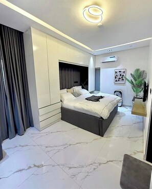 Economy Apartment, Balcony, City View | In-room safe, desk, laptop workspace, blackout curtains - De-Oma Villa Hotel And Apartment (Benin City)