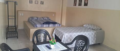 Triple Room | Laptop workspace, blackout drapes, iron/ironing board, free WiFi