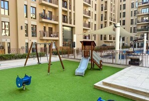 Children’s area - Silk Valley - Luxury Studio with pool views and steps away from Park (Dubai)