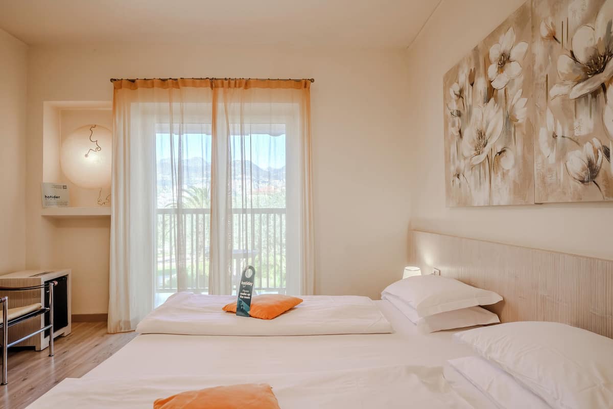 Standard Double Room, Balcony | In-room safe, desk, free WiFi