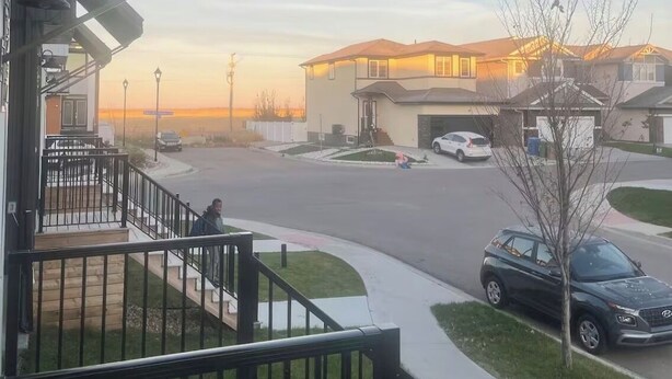 A residential street view with houses, a clear sky, and a parked car. - A gorgeously cozy 1-bedroom apartment to keep you comfy while you enjoy Regina (Regina)