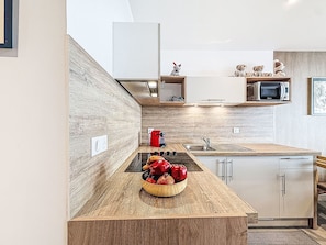 Fridge, microwave, cookware/dishes/utensils - Le Curling B (Val Claret) by Interhome (Tignes)