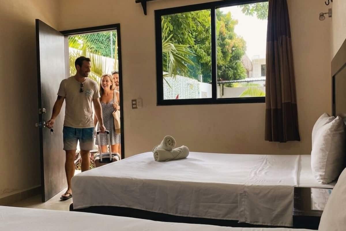 Comfort Room, 2 Double Beds, Refrigerator | Iron/ironing board, free WiFi, bed sheets