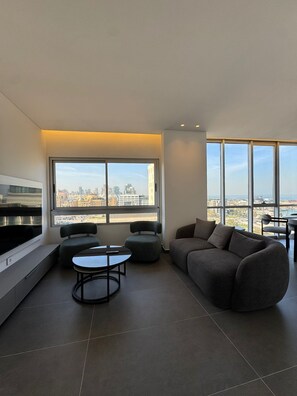 Appartement Deluxe, vue sur la ville | Aire de séjour
