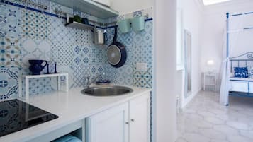 Deluxe suite, uitzicht op zee | Privékeuken