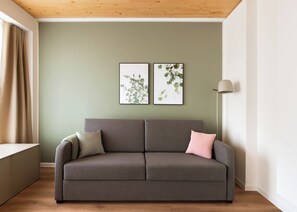 Suite Confort, 1 cama de matrimonio con sofá cama | Decoración individual, mobiliario individual, escritorio