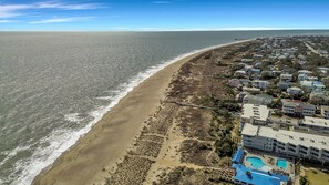 On the beach - The Great Escape is the kind of beach place you come back to. With beach access, pools, and The Deck right on site, it’s made for slow mornings, salty air, and years of memories. (Tybee Island)