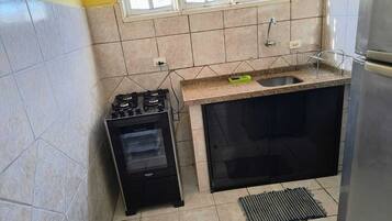 Casa família, varanda coberta | Cozinha privada | Geladeira grande, micro-ondas, fogão, cooktop