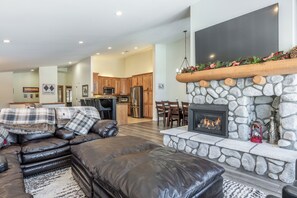 Smart TV, fireplace, foosball, books