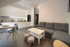 Apartment, Balcony, Mountain View | Living area | Flat-screen TV - RentPlanet - Apartamenty Narutowicza (Karpacz)