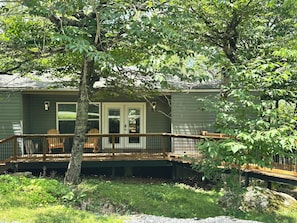 A house with a deck, a front door, and a small porch area. - SW-59 Deaver's Delight  Newly remodeled (Beech Mountain)