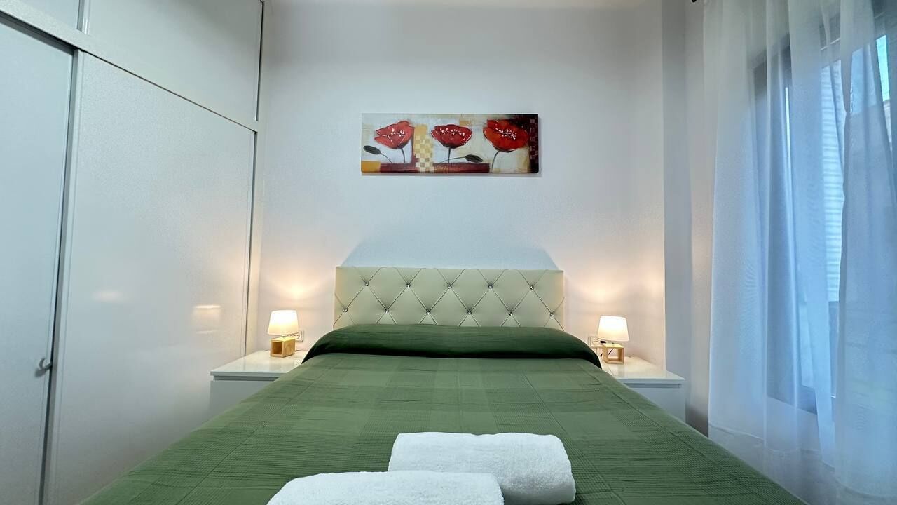 Habitación doble, baño compartido | Tabla de planchar con plancha y wifi gratis