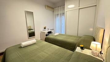 Twin Room, Shared Bathroom | Iron/ironing board, free WiFi