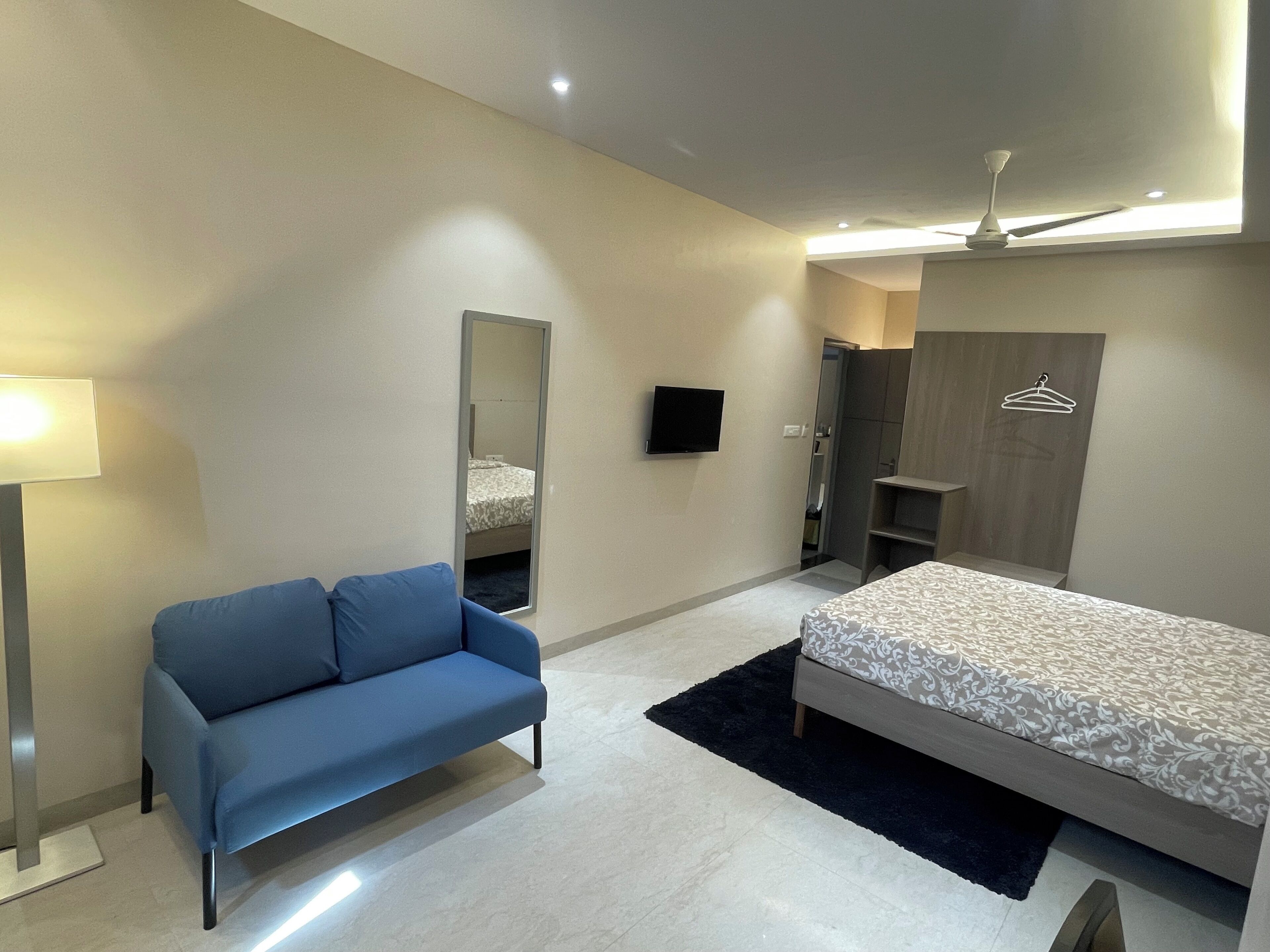 Deluxe Triple Room, City View | Desk, laptop workspace, blackout drapes, soundproofing