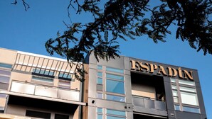 A building with the name "ESPADIN" on the facade, featuring a modern architectural style with large windows and balconies. - 2880: Serenity in Style at Espadin (Denver)