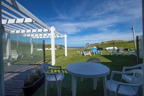 Executive Apartment, 1 Bedroom, Beach View, Ground Floor | Outdoor dining - Torrecillas Carilo (Cariló)