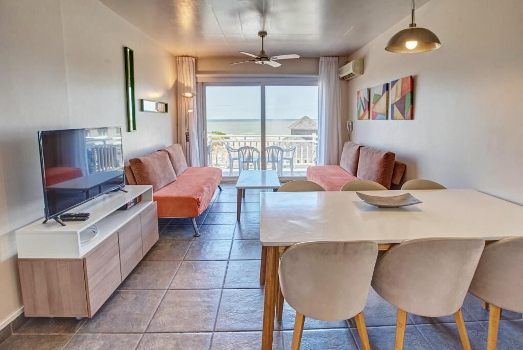 Executive Apartment, Hot Tub, Beach View | Living area | Toys, heated floors