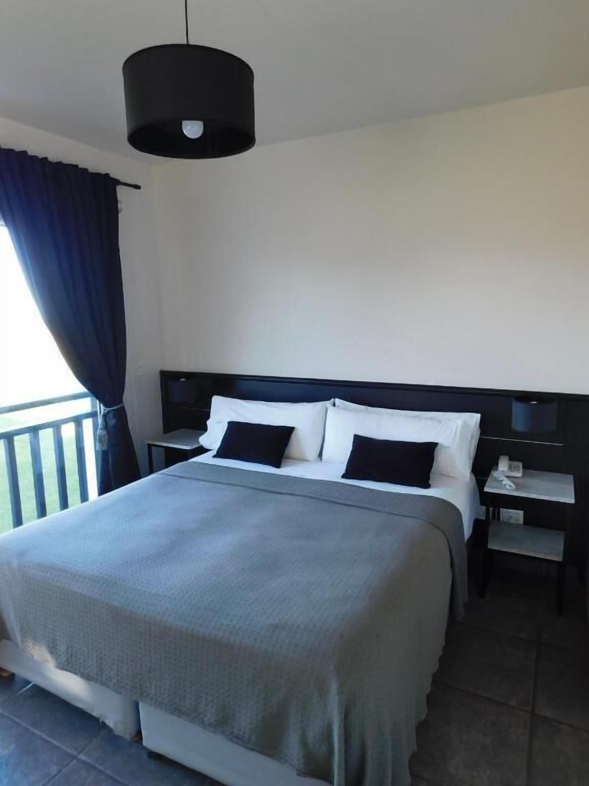 Căn hộ Executive, bồn tắm nước nóng, quang cảnh bãi biển | Két bảo mật tại phòng, màn/rèm cản sáng 