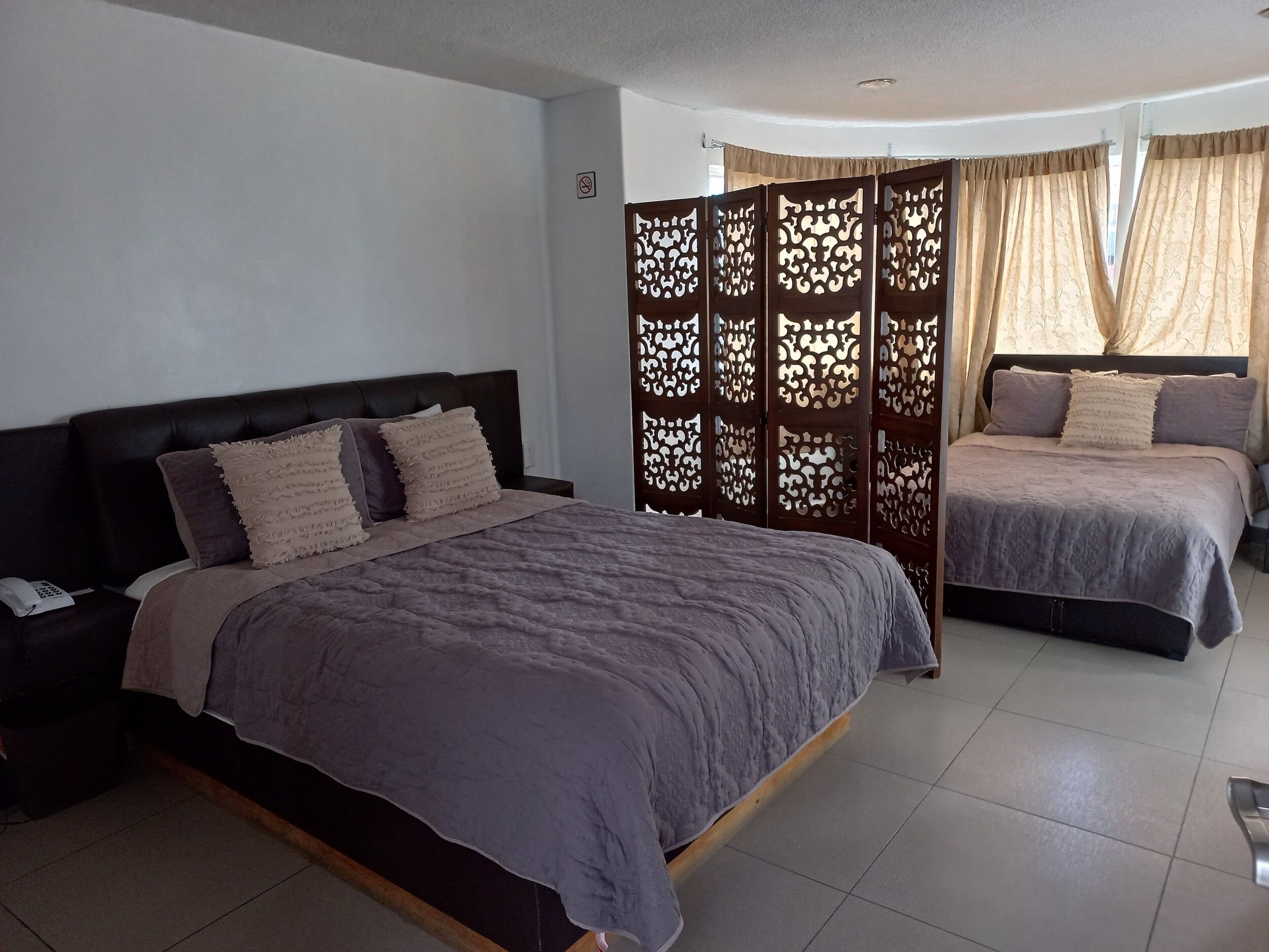 Family Room, Balcony, Garden View | Garden view