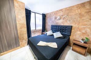 Coffres-forts dans les chambres, fer et planche à repasser