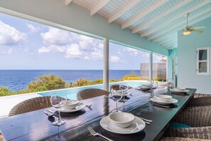 Outdoor dining - Petite Oceanfront Retreat, 2 Bedrooms, Private Infinity Pool, Serene (Kralendijk)
