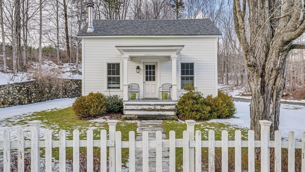 A small white house with a chimney, a front porch, and a stone wall. - 12 Mi to Bromley Mtn Ski Resort: Quiet Hideaway (Manchester Center)