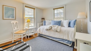 A bedroom with a bed, a chair, a desk, and a window. - 12 Mi to Bromley Mtn Ski Resort: Quiet Hideaway (Manchester Center)