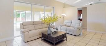 3BR Palm-surrounded Stay w/ Yard & A/C