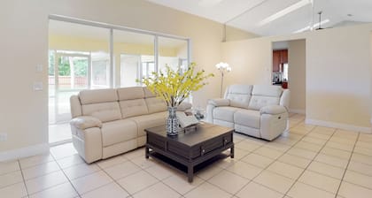 3BR Palm-surrounded Stay w/ Yard & A/C