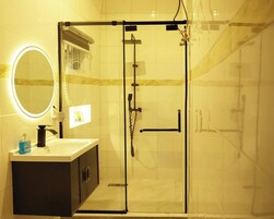 Family Room, Balcony, City View | Bathroom | Free toiletries, hair dryer, towels, soap