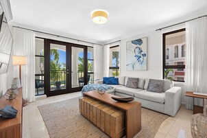 Deluxe Apartment, Balcony | Living area | 32-inch LED TV with digital channels