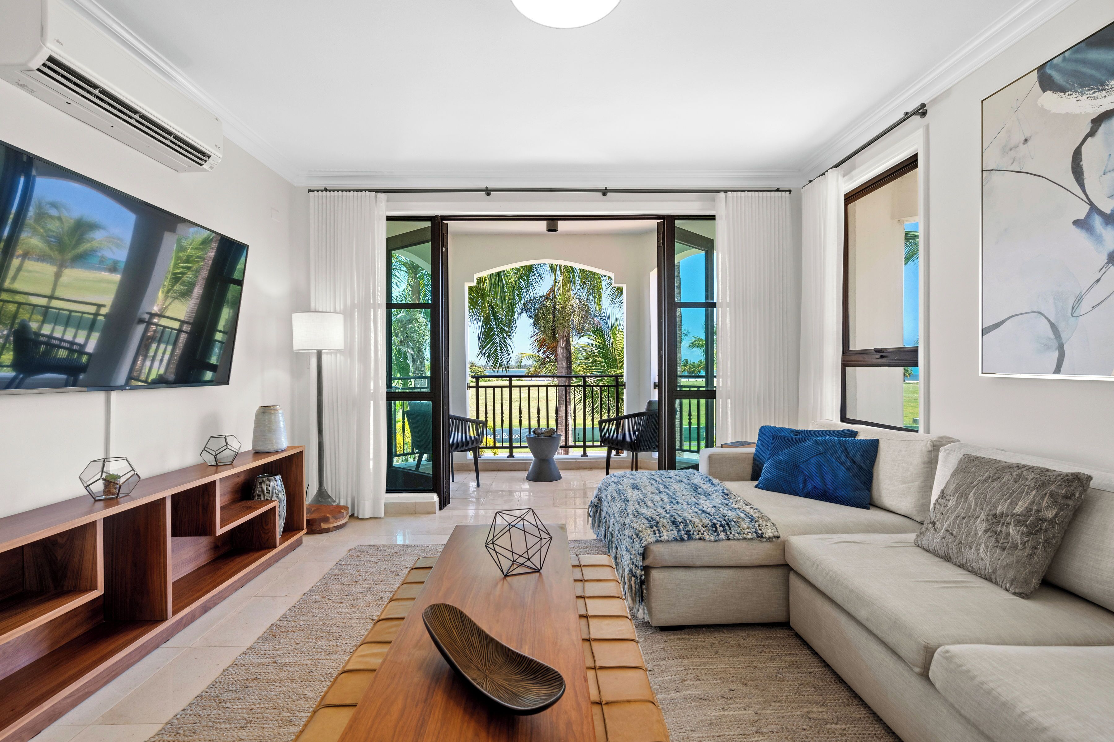 Deluxe Apartment, Balcony | Living area | 32-inch LED TV with digital channels