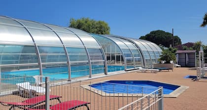 Chalet in private residential park with WIFI, heated indoor swimming pool