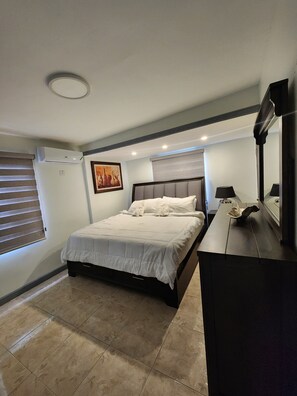 Casa | Tabla de planchar con plancha, wifi gratis y ropa de cama 